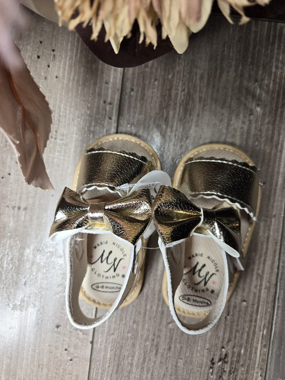 NWT Marie Nicole Metallic Gold Bow Baby Girl Sandals 0–6M